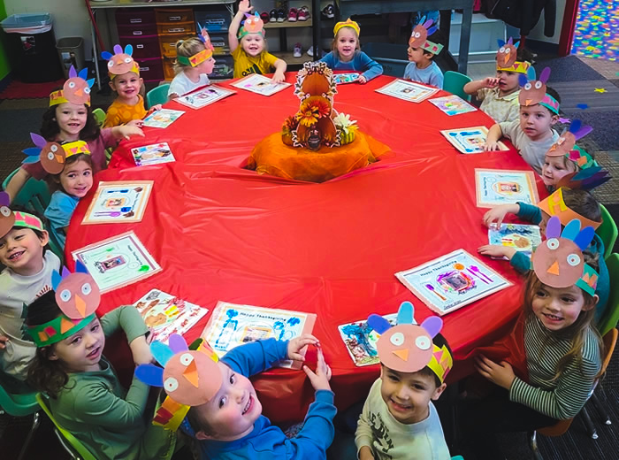 Child sitting together in preschool